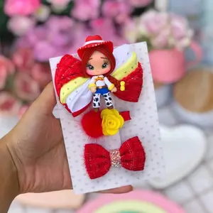 cute girls hair bow with porcelain doll