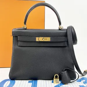 Pre-owned HERMÈS 1 Top Handle Bags Hermes 2022 Hermes Togo Kelly Retourne 28 Noir w/ Gold Hardware in Noir