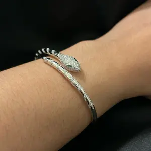 Elegant Snake Design Bracelet for Women - Silver Tone Cuff with Detailed Engraving and Sparkling Eye Feature