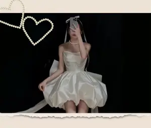 Story Elegant White Satin Mini Dress with Off the Shoulder Neckline Perfect for Cocktail Parties and Celebrations