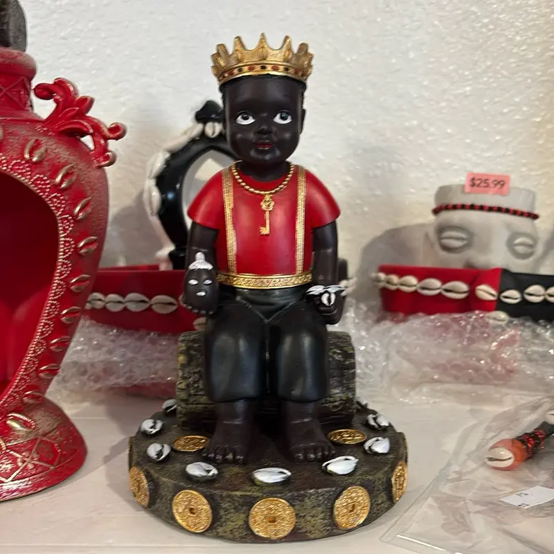 Elegua sentado