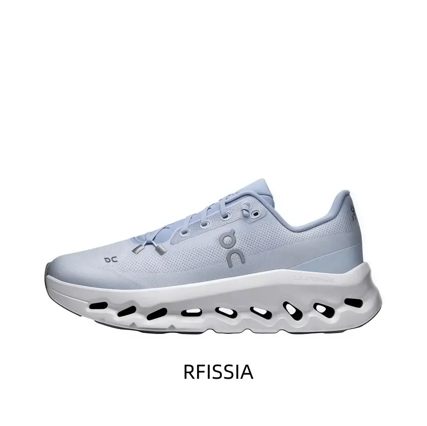 Ice Blue And White Technical Running Shoe Featuring A Distinctive Hollow-Core Segmented Midsole, Integrated Quick-Lace System, And A Heel Pull Tab