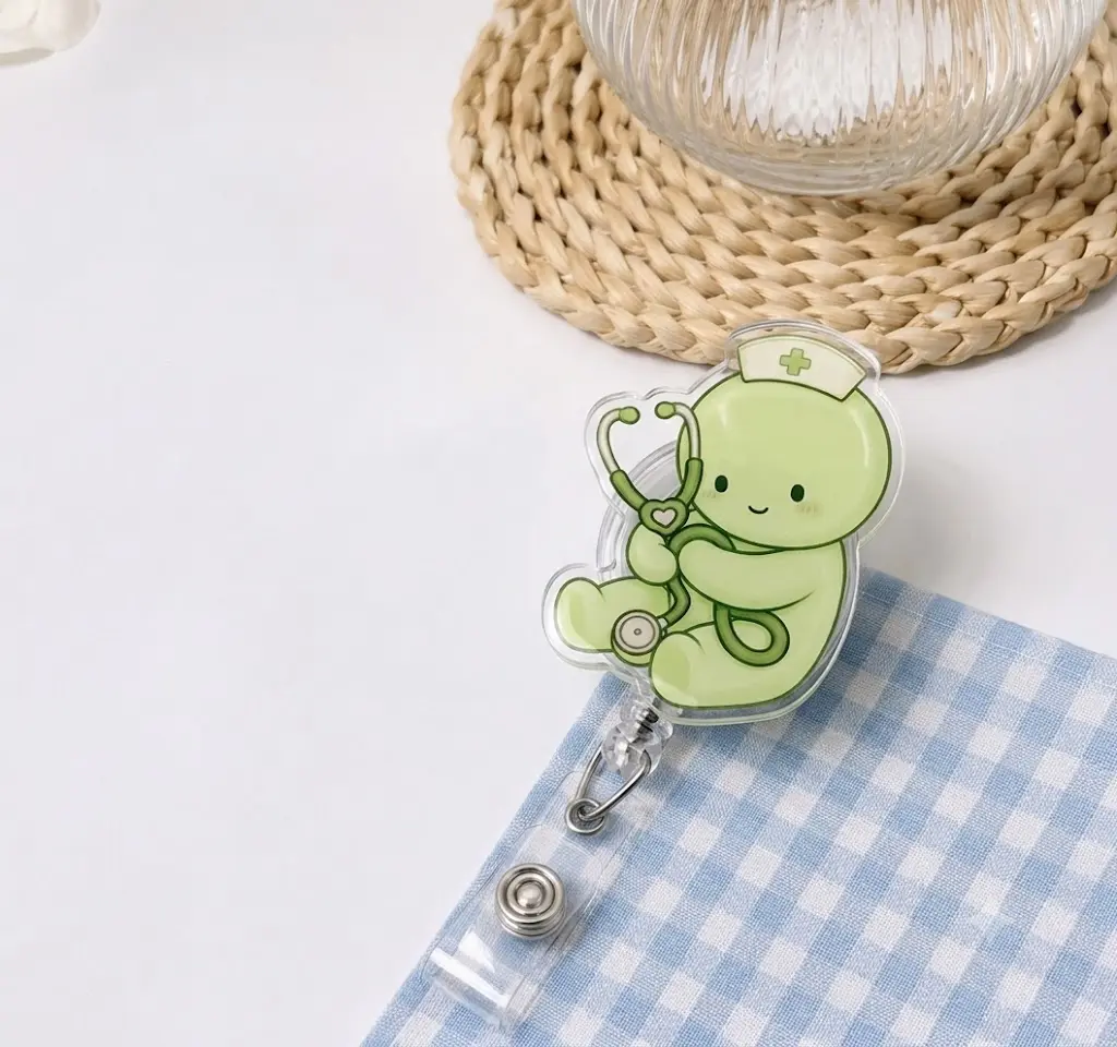 Pastel Green Medical Badge Reel, Retractable Acrylic ID Holder with Smiling Nurse Character, Stethoscope and Cross Cap, Cute Gift for Healthcare Workers and Nursing Students