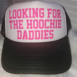 looking for the hoochie daddies trucker hat [pink  writing]