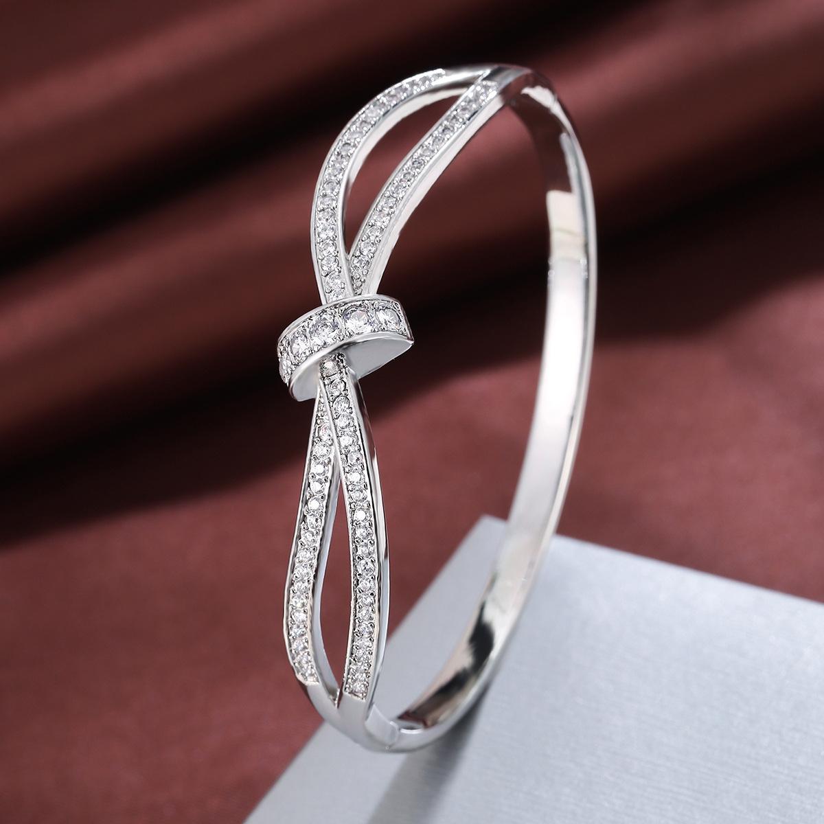 Luxury Intertwined Ribbon Knot Bangle Bracelet for Women, Elegant Polished Sparkle Hinged Cuff Bangle, Premium Statement Bracelet, Trendy 2026 Aesthetic Bridal Formal Jewelry, Timeless Anniversary Birthday Gift for Her