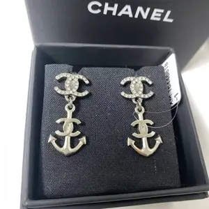 Pre-owned Chanel Silver Crystal Strass Logo and Anchor Motif Drop Earrings 1115GIA0130