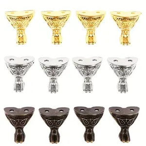 Set of Four Vintage Golden Gift Boxes Made of Zinc Alloy, Featuring a Wooden Base And Supported by Four Corner Feet with Animal Face Designs