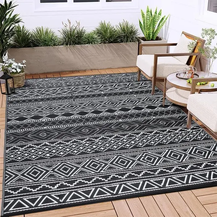 GARVEE Outdoor Reversible Rugs: Waterproof, UV Resistant, and Portable. Available in multiple sizes (5x8 ft to 9x18 ft) and colors. Ideal for camping, patio, deck, RV, and beach use.