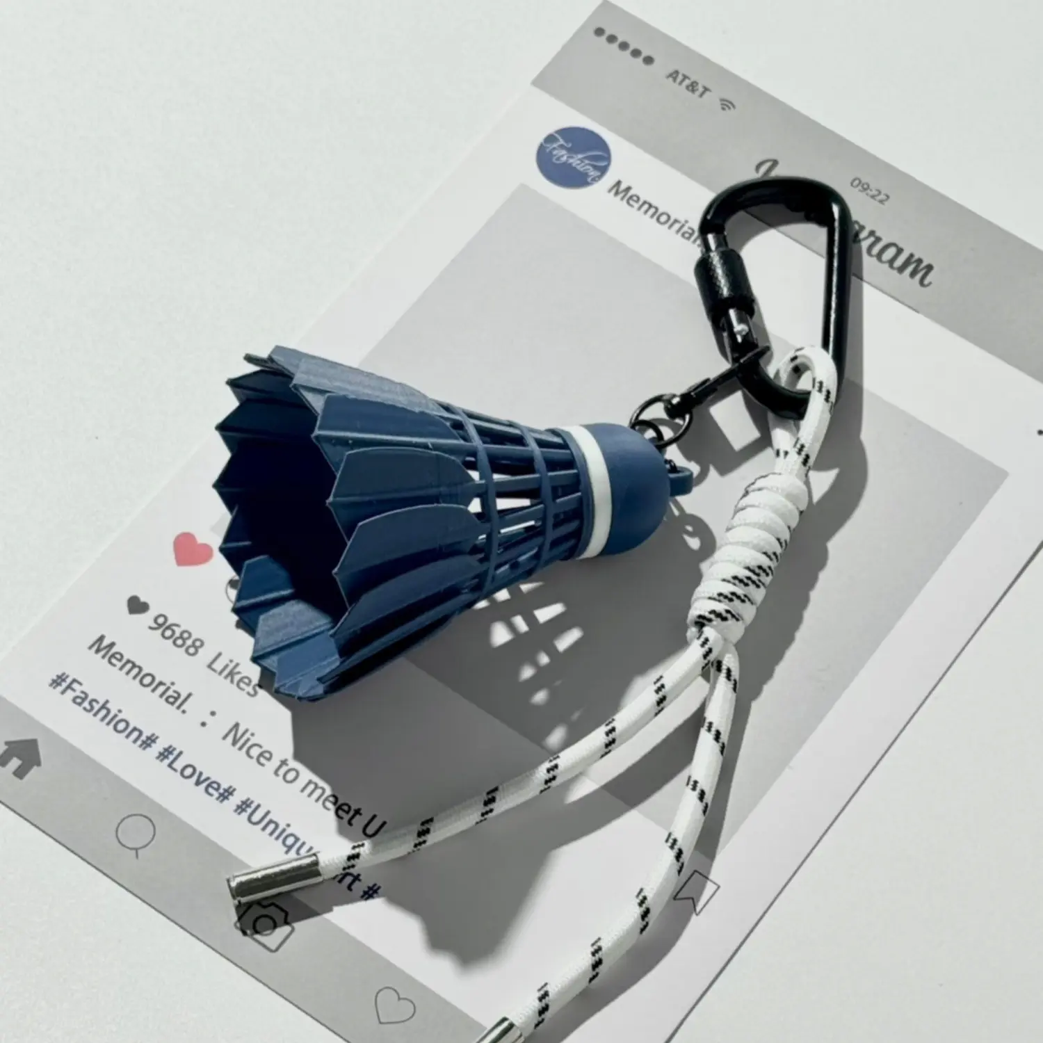 Dark blue badminton +  black and white rope