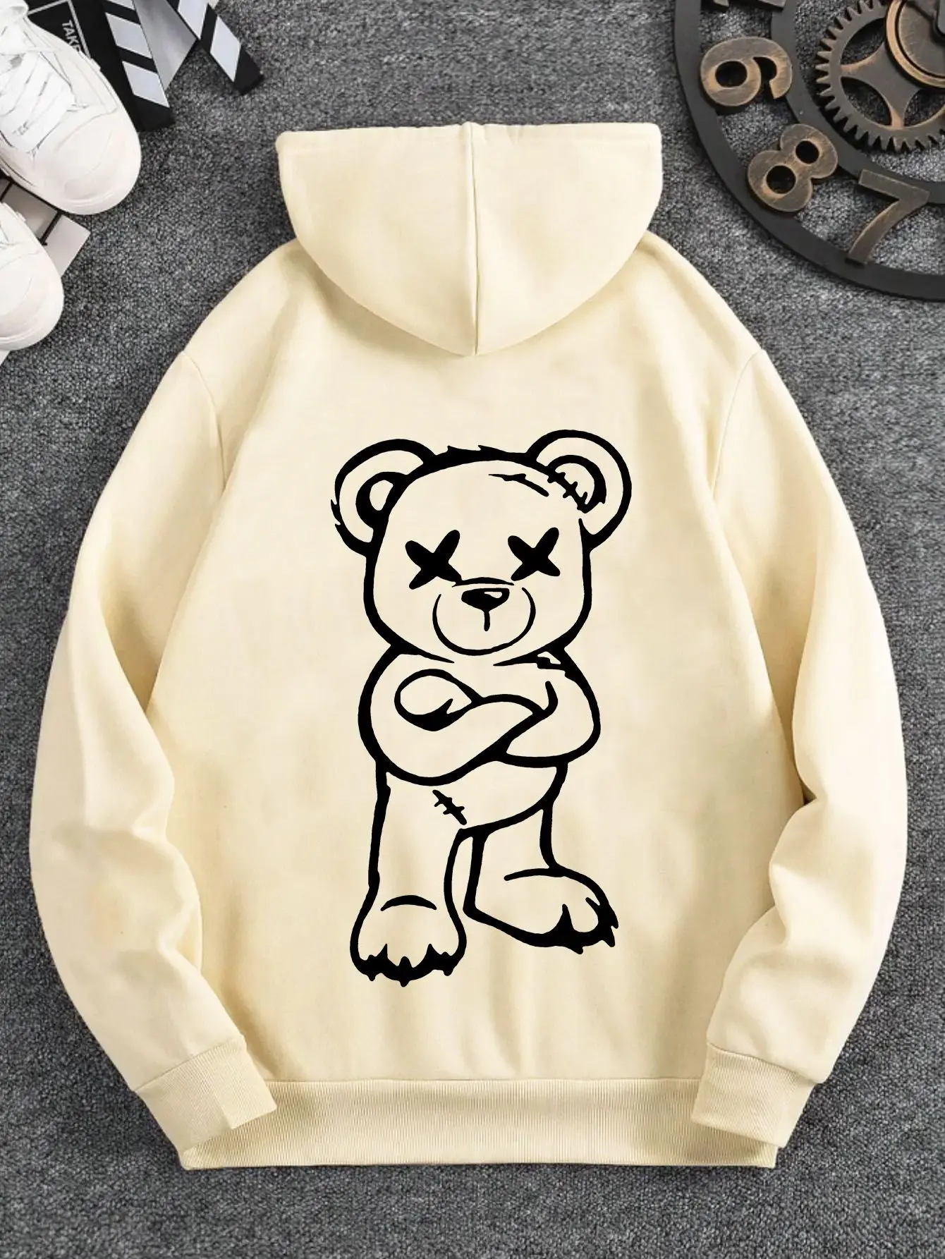 Playful Men's Hooded Sweatshirt Featuring a Rebellious Cross-Eyed Playful Men's Hooded Sweatshirt Featuring a Rebellious Cross-Eyed