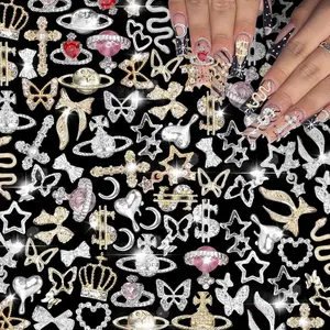 105 Pcs Silver+Gold Nail Gems Charms, Planet Crown Dollar Nail Gems Snake Star Bow Nail Charms 3D Cross Nail Art Jewelry Charms + Gold Dollar Charms for Nail Art DIY Jewel Accessories