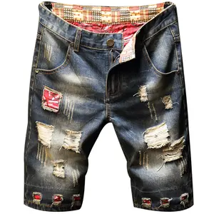 Summer men’s plus-size mid-thigh denim shorts — retro trendy distressed look with color blocking and patch details; ultra-large straight cut. Ideal for vacations/travel and casual wear; stylish bright patches; suitable for commuting; height-enhancing, sli