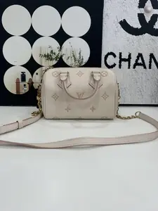 Pre-owned Louis Vuitton Speedy Bandoulière 20 Cream White Monogram Empreinte Leather Handbag – Pink Trim – Chip Version