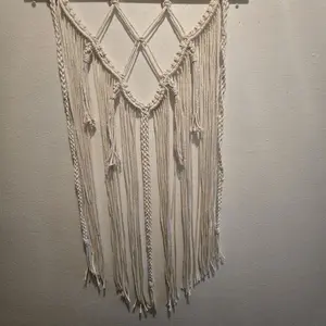 Handmade Macrame Wall Hanging with Intricate Braided Design and Fringe Accents for Boho Home Decor