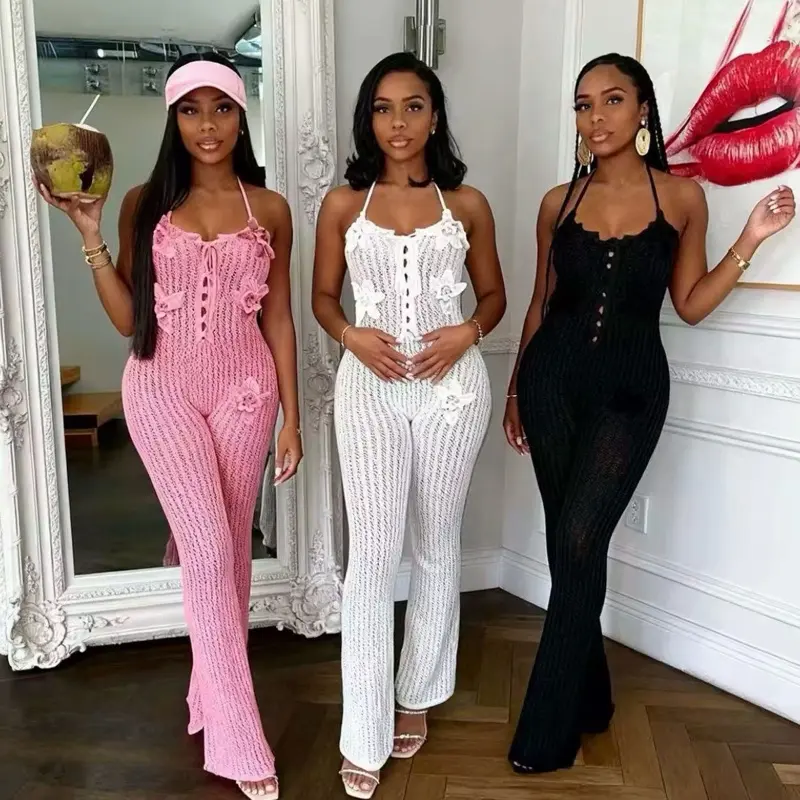 Knitted Jumpsuit in Pink, White, and Black with Floral Details and Flared Leg Design