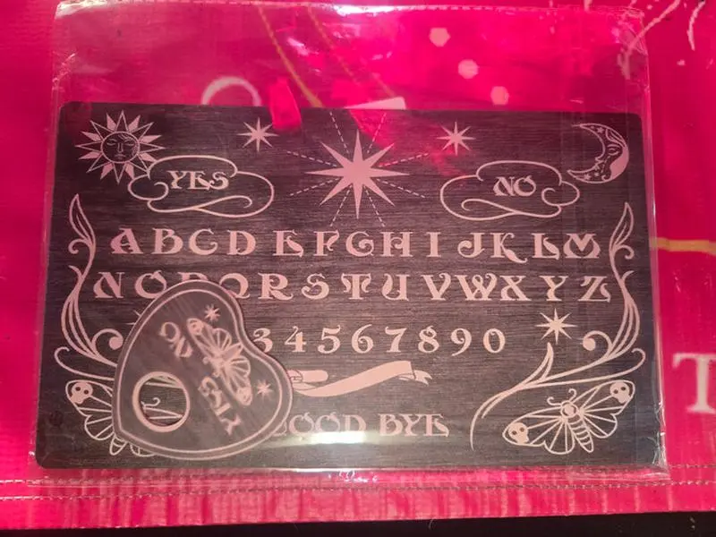 Unlock the Mysteries Beyond with Our Ouija Board!