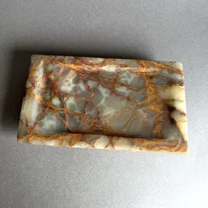 Sienna, gold, and forest green | SAÉA Onyx Catchall Tray