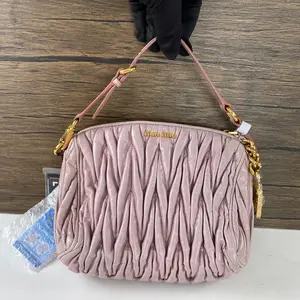 Pre-owned miumiu leather Shoulder Bags Miu Miu pink matelassé crossbody bag with gold tone hardware QG2207#