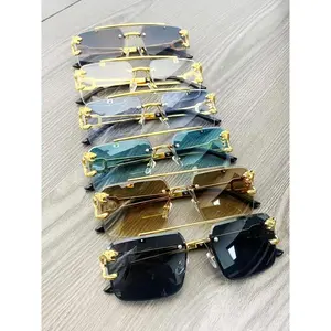 Unisex top-bar rimless metal sunglasses, trendy tinted-lens sunglasses for everyday use, fashion accessories for outdoor activities