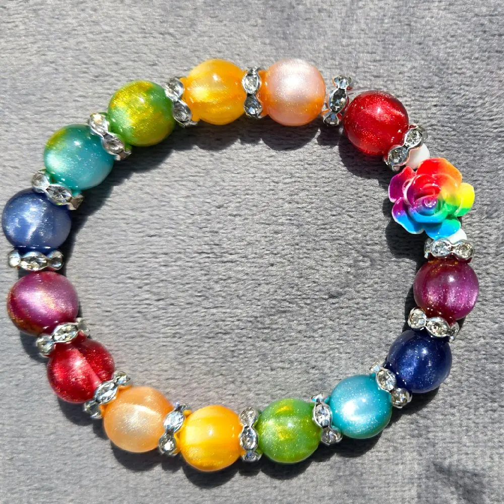 shimmering rainbow PRIDE bracelet  with multi colored rose and 10mm beads