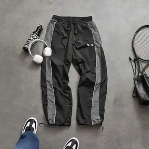 Men's Casual Streetwear Contrast Color Sporty Long Pants, Windbreaker Pants ,Loose Fit Drawstring Cuff, Fashionable Print, Lightweight Fabric, Athleisure Style Bottoms pantalones para hombre pants for men cargo pants for men pantalones de trabajo hombre o