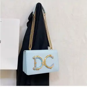 Light Blue Crossbody Bag with Gold Chain Strap and Embossed Logo for Women's Fashion