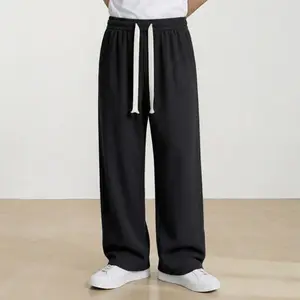 Men’s American vintage corduroy straight-leg pants—trendy, versatile brown casual long trousers with a drawstring waist and loose fit; simple, stylish men’s bottoms suitable for everyday wear and sports.