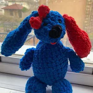 Amigurumi Easter Bunny - Blue Crocheted Plush Toy with Red Ears and Red Bow, Ideal for Easter Celebrations