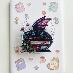 Dragon Sleeping on Books Phone Grip – Fantasy Bookish Accessory, Dark Floral Aesthetic Holder, Unique Gift for Book Lovers & Dragon Fans.