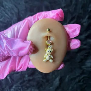 Golden teddy belly ring
