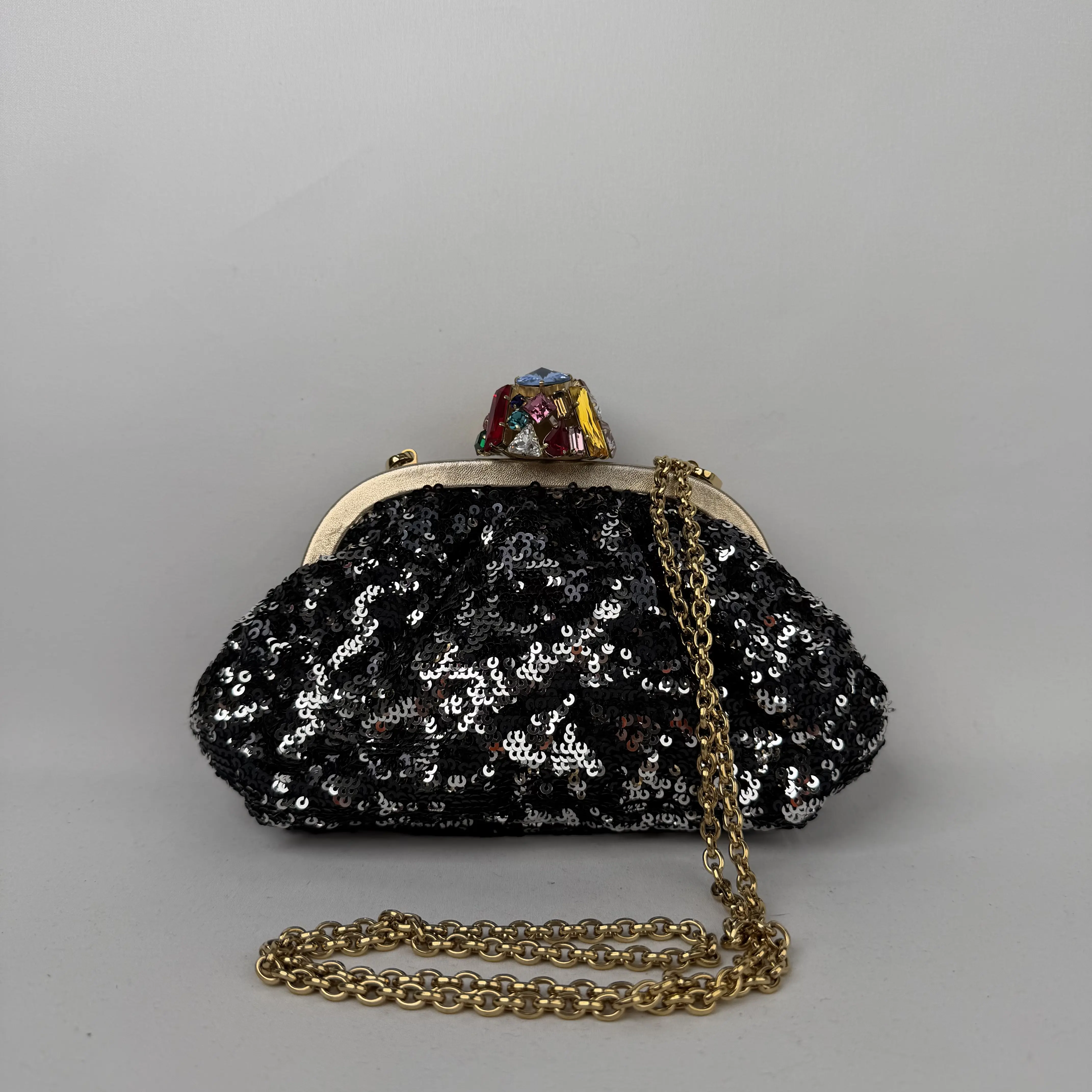 Pre-owned DOLCE & GABBANA Black sequin fabric with crystal-embellished metal frame Clutches & Wristlets Dolce&Gabbana Crystal Frame Clutch Black with multicolor crystal clasp, gold tone hardware Good S028260613009