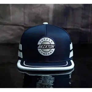 Premium khaki hip-hop snapback cap with round Brixton logo, lightweight and breathable, featuring a snap button closure and fashionable design for men