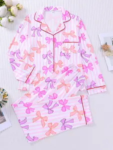 2-piece set with white background, full body red bow print, long sleeved pants, top with small pockets, button closure, elastic waistband, soft and comfortable, skin friendly, smooth, suitable for all seasons, home and daily wear, pajamas