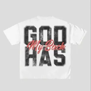 A-God Has My Back Christian Graphic T-Shirt | Premium Heavyweight White Cotton Oversized Streetwear Tee | Faith Based Boxy Fit Retro Shirt | Urban Aesthetic High Quality Apparel | Varsity Style Back Print | Religious Gospel Top | Streetwear Luxe | Unisex