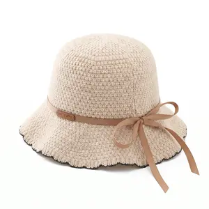 Handcrafted grass hats. Women’s knitted bucket hats, breathable crocheted sun hats with bow ties, wave-patterned wide-brimmed beach hats. Perfect for summer outdoor trips and beach vacations.