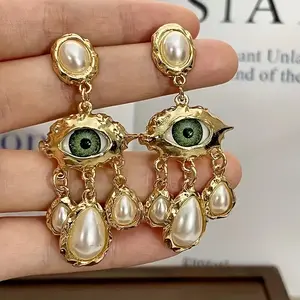 A pair of French medieval style exaggerated niche design sense fashionable earrings big eyes long tassel water drop shape party daily