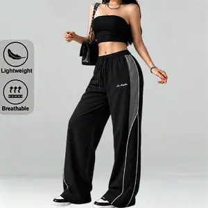 Women’s lightweight summer sports pants—lightweight and soft; street dance pants. Loose casual long pants with gray side color-block stripes paired with white decorative stripes; comfortable design, sporty casual bottoms for gym wear; street dance pants.