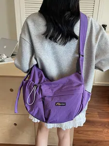 Retro functional style simple casual dumpling bag, drawstring decoration, multi pocket design, fashionable personality, large capacity texture single shoulder crossbody bag, can accommodate personal belongings