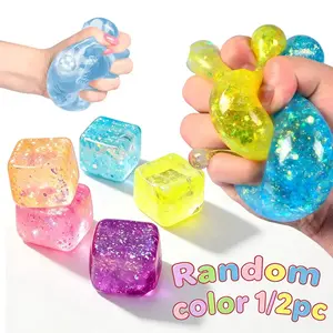 1/2 piece. Glitter ice cube shaped squeeze toy brings joy. Just squeeze and it's easy. These creative soft ice cubes are a must-have for party celebrations, squeezy toys, soft stretchable pinch toys, and Christmas gifts in random colors