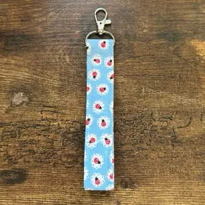 Ladybugs on Light Blue Fabric Keychain