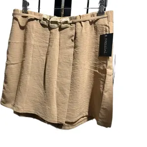 This item is a pair of tan-colored women's tailored shorts Womenswear Bottom