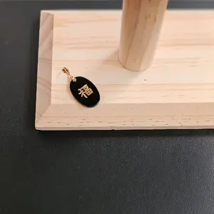 14k gold black onyx pendant