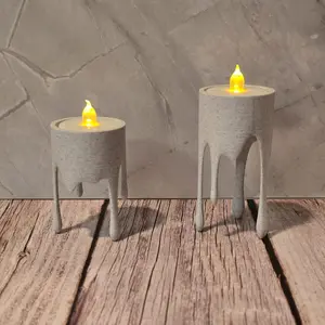 Drip tea light candle holders