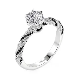 Jeulia Twisted Black and White Round Solitaire Engagement Ring