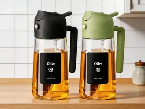 2-pack 2-in-1 glass oil spray and pour bottles, 470ml each. Practical for air frying, salads, grilling and daily cooking, available in black and green.
