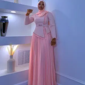 Elegant Pink Long Sleeve Dress with Pleated Skirt and Floral Embellishments for Special Occasions