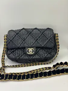 Pre-owned CHANEL 21A Limited Edition Coin Chain Crossbody Bag. Crinkled design with coin chain detail. Calfskin leather. Stamped version.Bag only, no accessories included. Size: 22 × 14 cm.