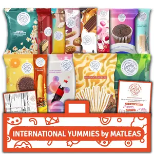 Midi International Snack Box | Premium Exotic Foreign Snacks | Unique Snack Food Gifts Included | Orange Nebula Space Theme | Candies from Around the World | 12 Full-Size + 1 Bonus Snacks