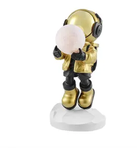 HADFIELD TAKES THE MOON // LIGHTED ASTRONAUT- SCULPTURE // BLACK & GOLD