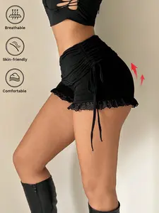 Black pleated lace-bottom shorts | High-waisted drawstring pants - featuring avant-garde tie details and lace hem. #OOTD # baddiedresses, #Y2KRevival. A fashionable night out, beach day #TikTokFashion #DarkCute #CasualChic